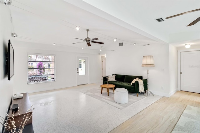 living room with ceiling fan