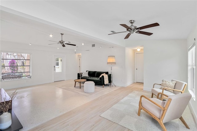 living room with ceiling fan