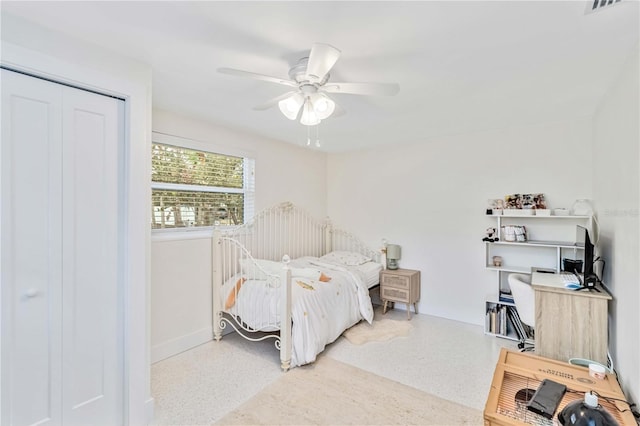 bedroom featuring a closet and ceiling fan