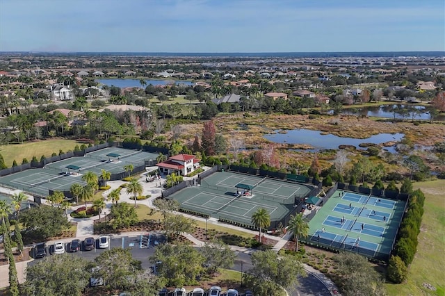 birds eye view of property featuring a residential view and a water view