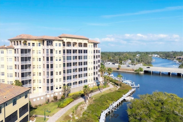 view of building exterior featuring a water view