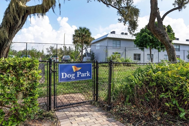 exterior space featuring fence and a gate