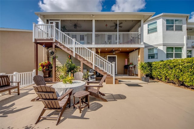 back of house featuring a patio and ceiling fan