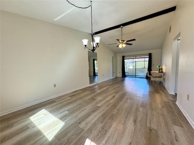 unfurnished living room featuring vaulted ceiling with beams, ceiling fan with notable chandelier, and light hardwood / wood-style floors