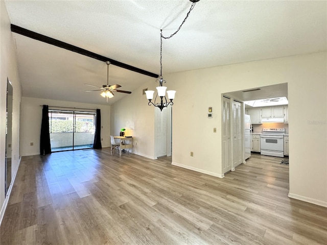 unfurnished living room with vaulted ceiling with beams, ceiling fan with notable chandelier, a textured ceiling, and light hardwood / wood-style flooring