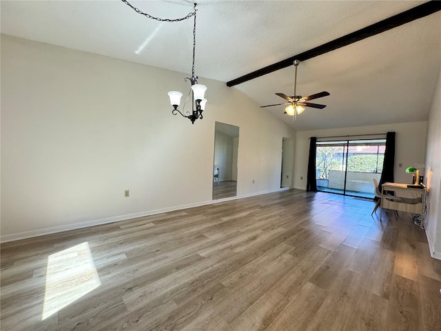 unfurnished living room featuring ceiling fan with notable chandelier, light hardwood / wood-style floors, a textured ceiling, and vaulted ceiling with beams