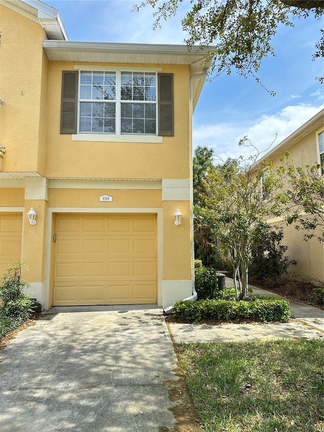 view of front of house with a garage