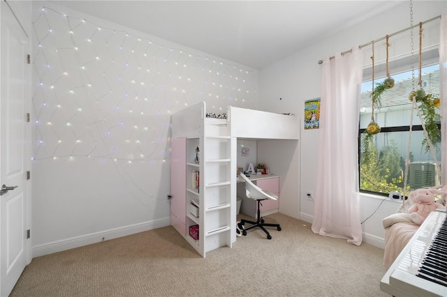 bedroom featuring light colored carpet