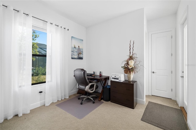 home office featuring light colored carpet