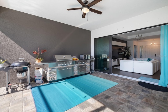 view of swimming pool with a grill and ceiling fan with notable chandelier