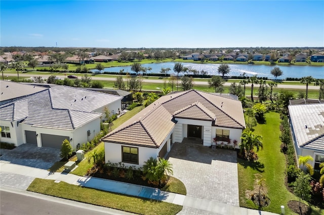 bird's eye view with a water view