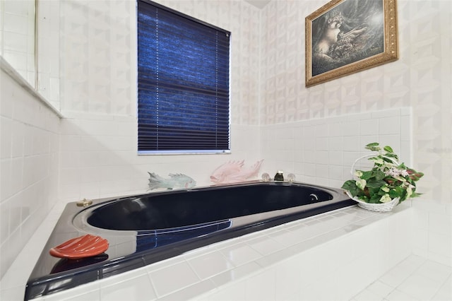 bathroom with tiled bath