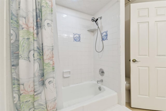 bathroom featuring shower / bath combination with curtain