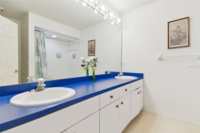 bathroom with walk in shower and vanity