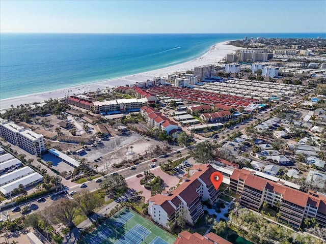 bird's eye view featuring a view of the beach and a water view