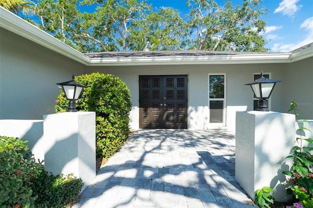 property entrance with a garage