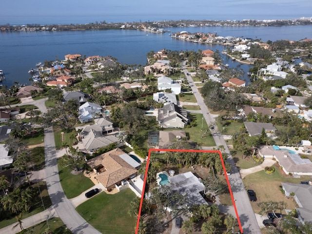 birds eye view of property featuring a water view