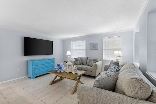 living area featuring light tile patterned floors, baseboards, and crown molding