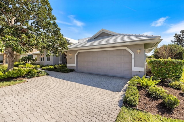 view of front of home with a garage