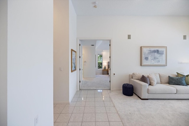 living room featuring light tile patterned flooring