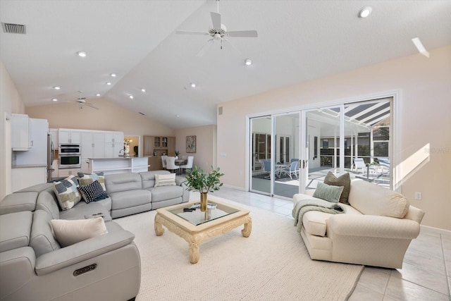 tiled living room featuring lofted ceiling and ceiling fan