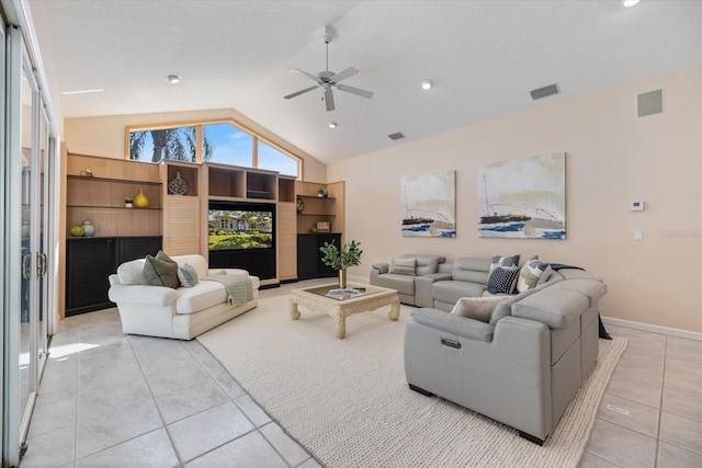 tiled living room featuring high vaulted ceiling and ceiling fan