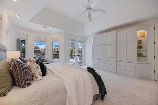 bedroom with french doors, ceiling fan, light carpet, and access to outside