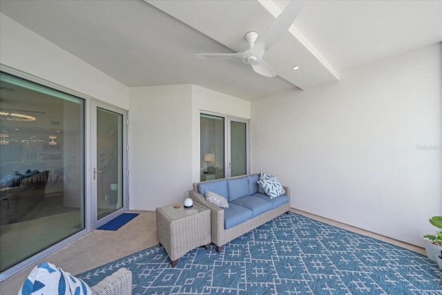 view of patio with an outdoor living space and ceiling fan