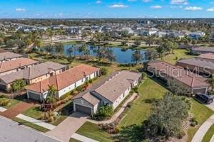 drone / aerial view with a water view