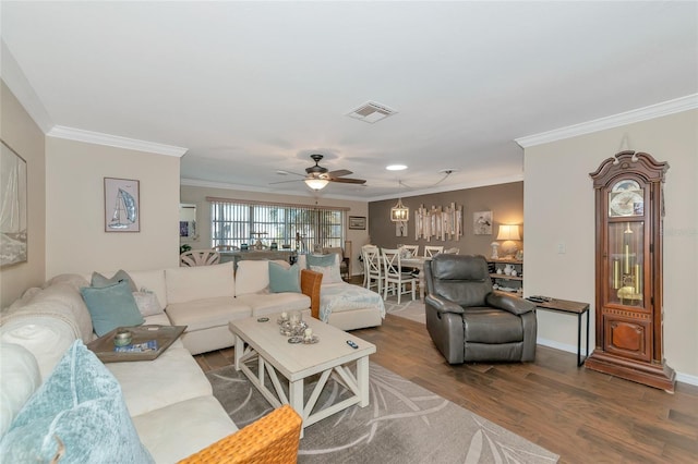 living room featuring crown molding, ceiling fan, and hardwood / wood-style floors