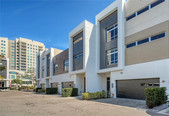 view of building exterior featuring a garage