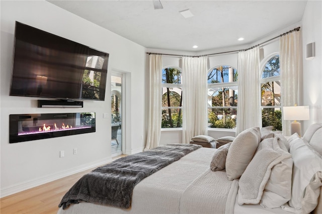 13315 Palmers Creek Ter, Lakewood Ranch, FL 34202 - bedroom featuring hardwood / wood-style flooring