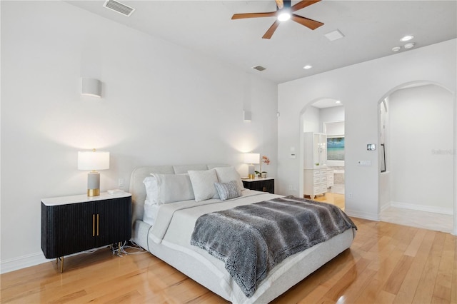 13315 Palmers Creek Ter, Lakewood Ranch, FL 34202 - bedroom with hardwood / wood-style flooring, ceiling fan, and ensuite bathroom