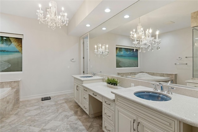 13315 Palmers Creek Ter, Lakewood Ranch, FL 34202 - bathroom with vanity, a relaxing tiled tub, and a chandelier
