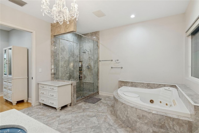 13315 Palmers Creek Ter, Lakewood Ranch, FL 34202 - bathroom with independent shower and bath, vanity, and a notable chandelier