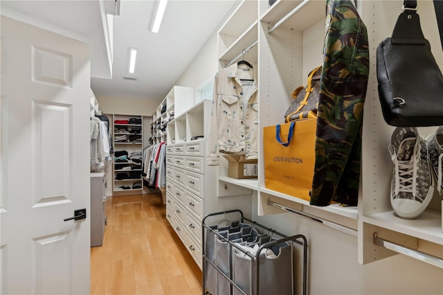 13315 Palmers Creek Ter, Lakewood Ranch, FL 34202 - spacious closet featuring light wood-type flooring