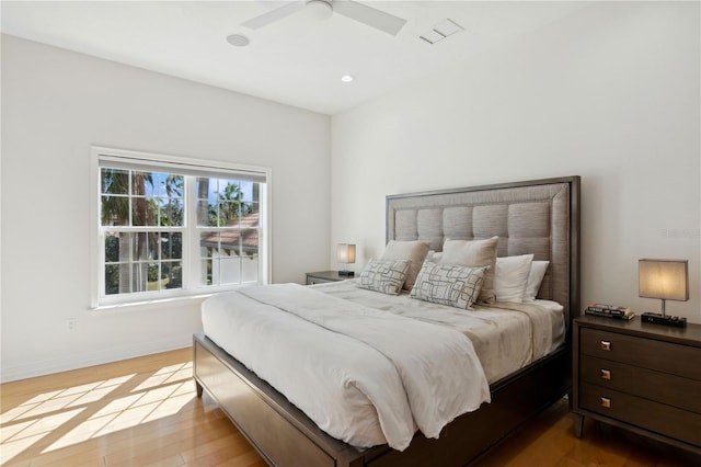 13315 Palmers Creek Ter, Lakewood Ranch, FL 34202 - bedroom featuring hardwood / wood-style floors and ceiling fan