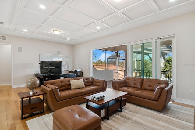13315 Palmers Creek Ter, Lakewood Ranch, FL 34202 - living room featuring coffered ceiling and light hardwood / wood-style floors