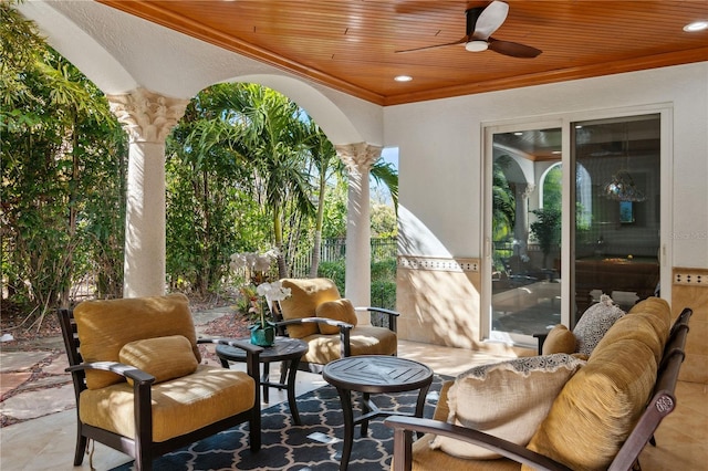 13315 Palmers Creek Ter, Lakewood Ranch, FL 34202 - view of patio / terrace with ceiling fan and an outdoor living space