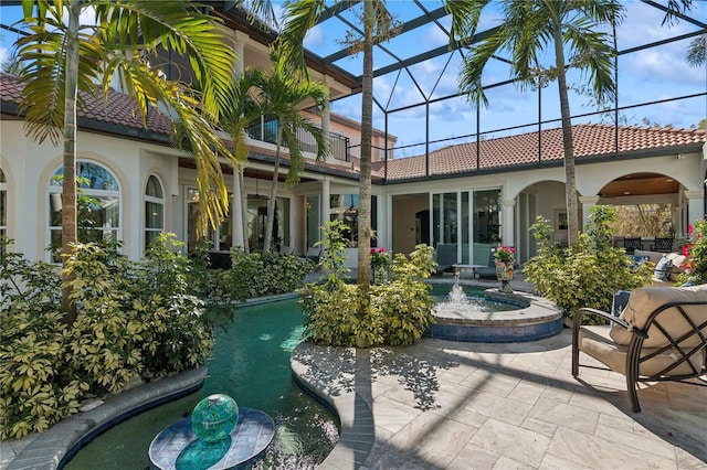 13315 Palmers Creek Ter, Lakewood Ranch, FL 34202 - rear view of property with a lanai and a patio