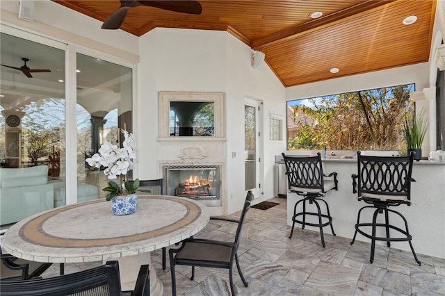 13315 Palmers Creek Ter, Lakewood Ranch, FL 34202 - view of patio / terrace with exterior bar and ceiling fan