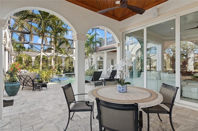 13315 Palmers Creek Ter, Lakewood Ranch, FL 34202 - sunroom featuring wood ceiling and ceiling fan