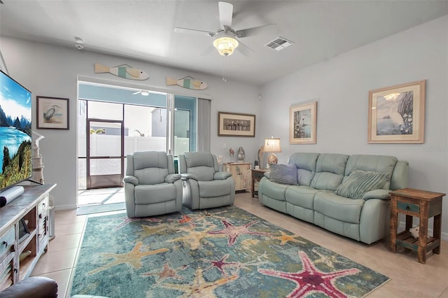 living room with light tile patterned floors and ceiling fan