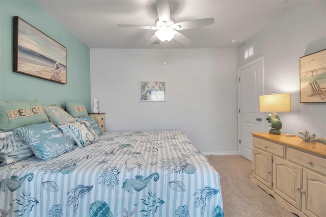 bedroom with light carpet and ceiling fan