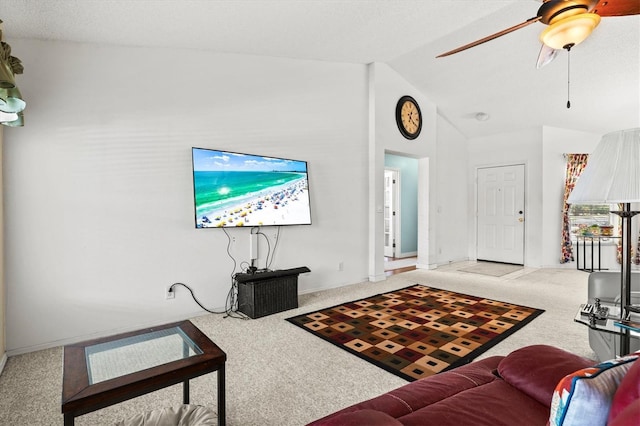 living room with light carpet, lofted ceiling, and ceiling fan