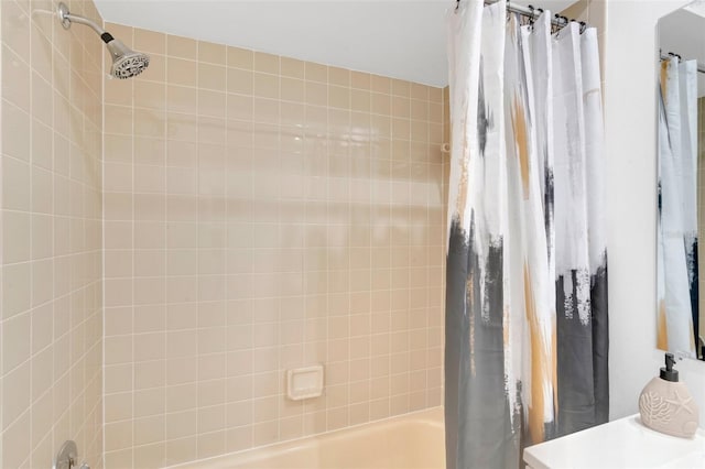 bathroom featuring shower / bath combo with shower curtain