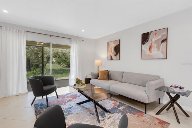 living area with light tile patterned floors and recessed lighting