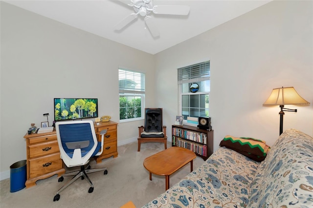 office area with carpet and ceiling fan