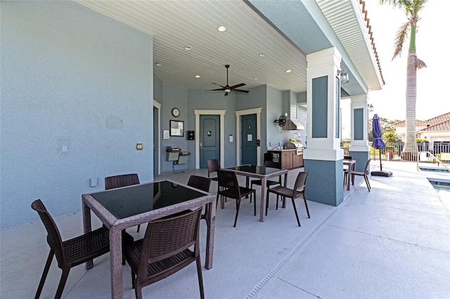 view of patio with ceiling fan