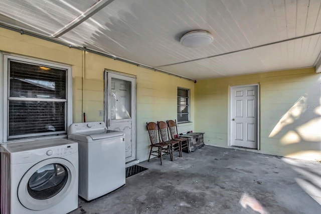 exterior space featuring washer and clothes dryer